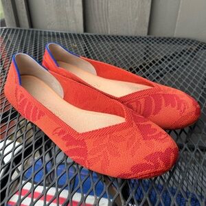 Rothy’s flats in women’s size 11 in a floral orange color. Very flexible